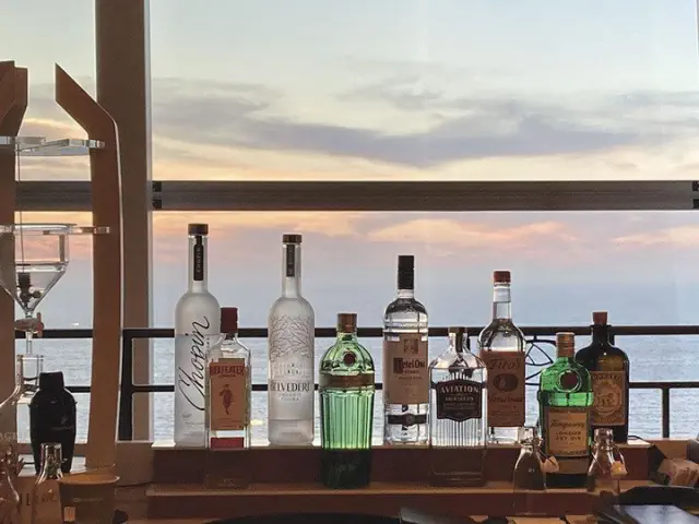 The Sunset Lounge at the Hyatt in Carmel Highlands boasts exquisite cocktails set against a breathtaking view.
