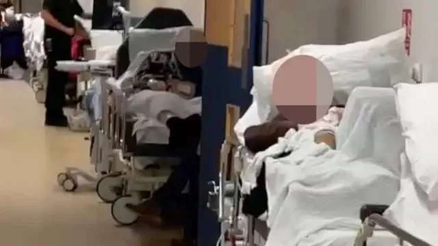 Emotional nurses expose the startling truth of NHS corridor treatment after a 'patient discovered deceased beneath coats.'
